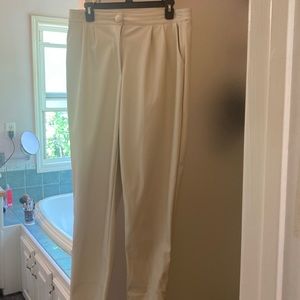 Princess Polly High waisted pants in cream with pockets. Loose fit legs size 10